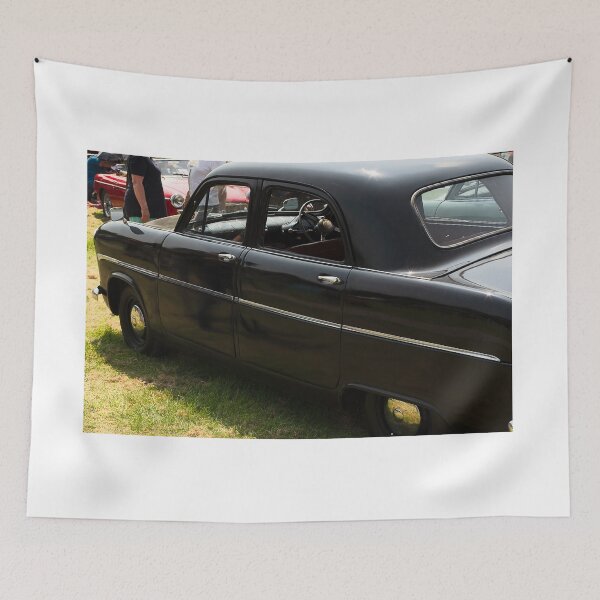 Item preview, The side of a black 1955 Ford Consul on display at a car show designed and sold by Graham Cornall.