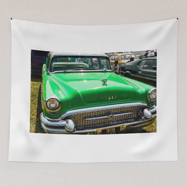 Item preview, The front of a green 1955 Buik Roadmaster on display at a car show designed and sold by Graham Cornall.