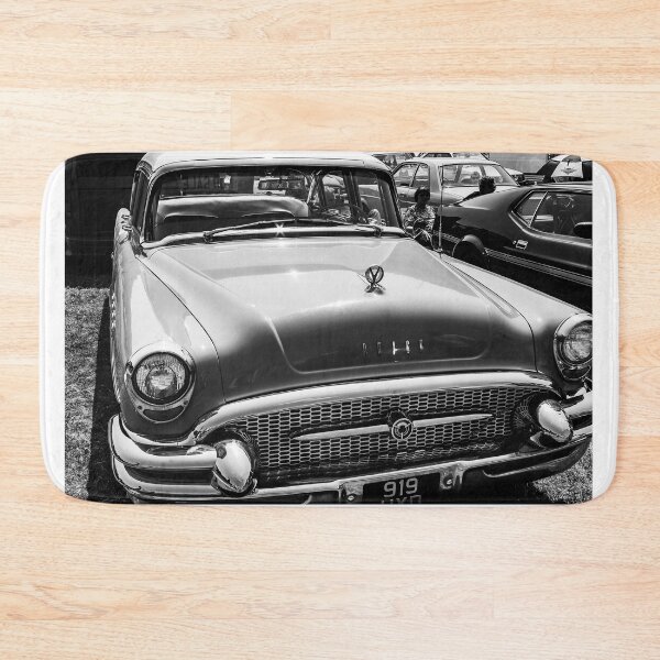 Item preview, A black and white image of the front of a green 1955 Buik Roadmaster on display at a car show designed and sold by Graham Cornall.