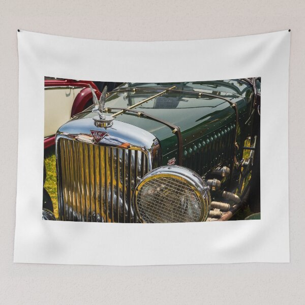Item preview, The front of a green 1940s Alvis roadster on display at a car show designed and sold by Graham Cornall.
