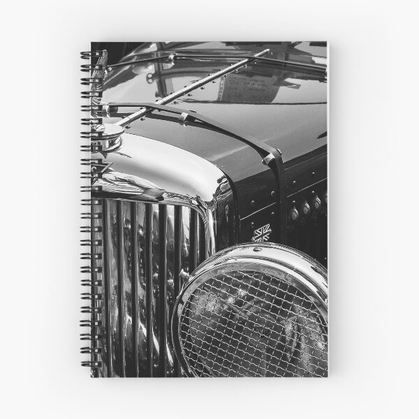 Item preview, A black and white image of the front of a green 1940s Alvis roadster on display at a car show designed and sold by Graham Cornall.