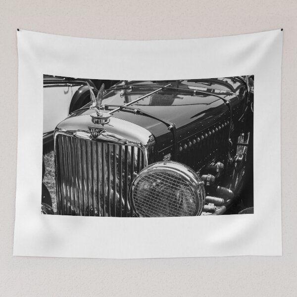 Item preview, A black and white image of the front of a green 1940s Alvis roadster on display at a car show designed and sold by Graham Cornall.