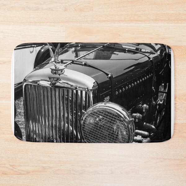 Item preview, A black and white image of the front of a green 1940s Alvis roadster on display at a car show designed and sold by Graham Cornall.
