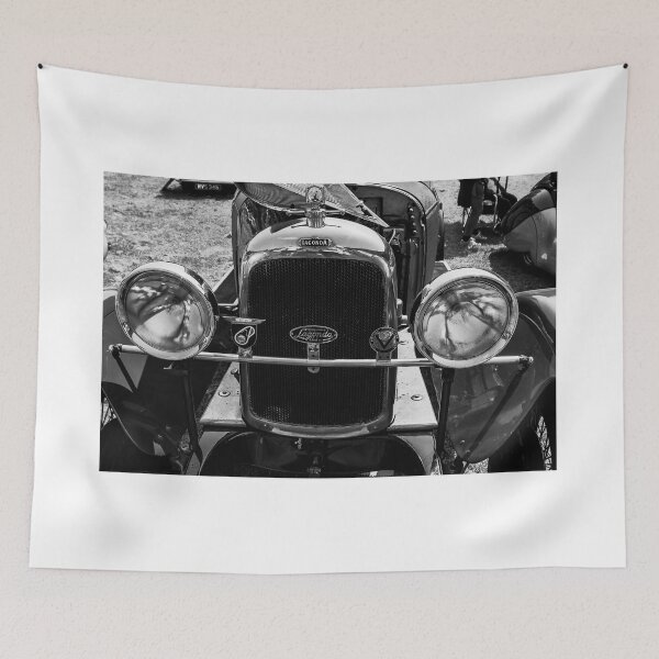 Item preview, A black and white image of the front of a green 1931 Lagonda 2 Litre T2 Low Chassis Tourer on display at a car show designed and sold by Graham Cornall.