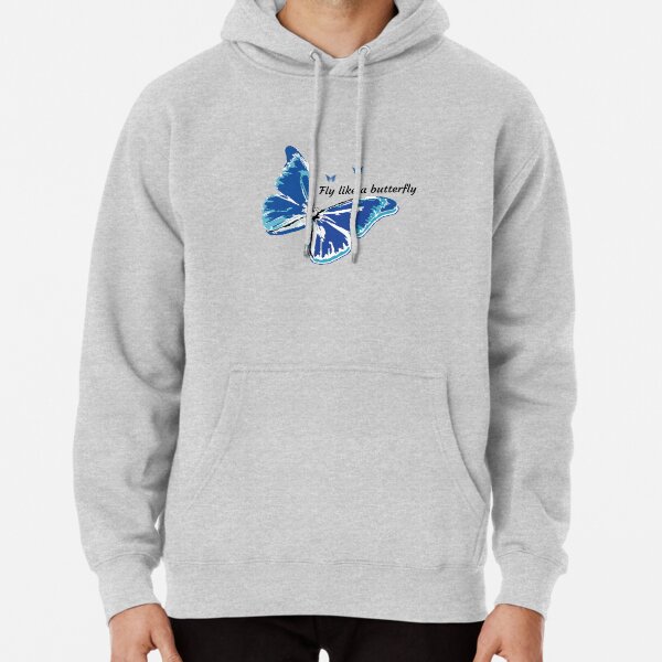 white jumper with blue butterfly