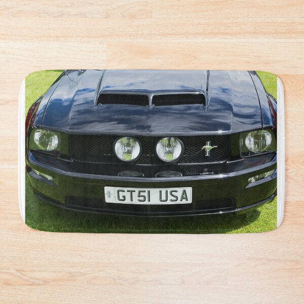 Item preview, The front of a black 2006 Ford Mustang GT on display at a car show designed and sold by Graham Cornall.