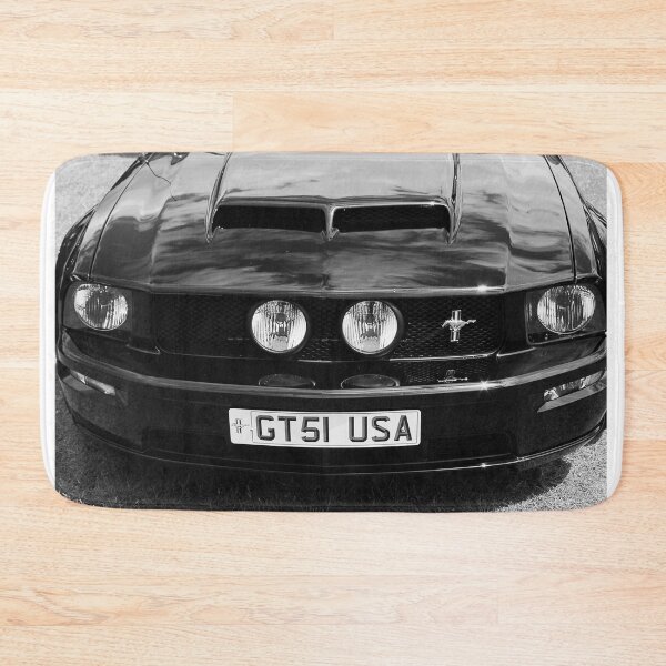 Item preview, A black and white image of the front of a black 2006 Ford Mustang GT on display at a car show designed and sold by Graham Cornall.