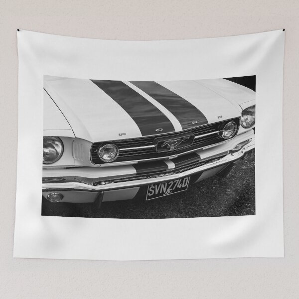 Item preview, A black and white image of the front of a white 1966 Ford Mustang on display at a car show designed and sold by Graham Cornall.