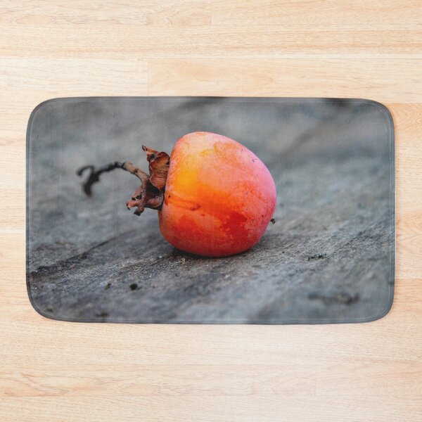 Item preview, Ripe persimmon fruit close-up on a wooden surface designed and sold by EG Creativity Art.
