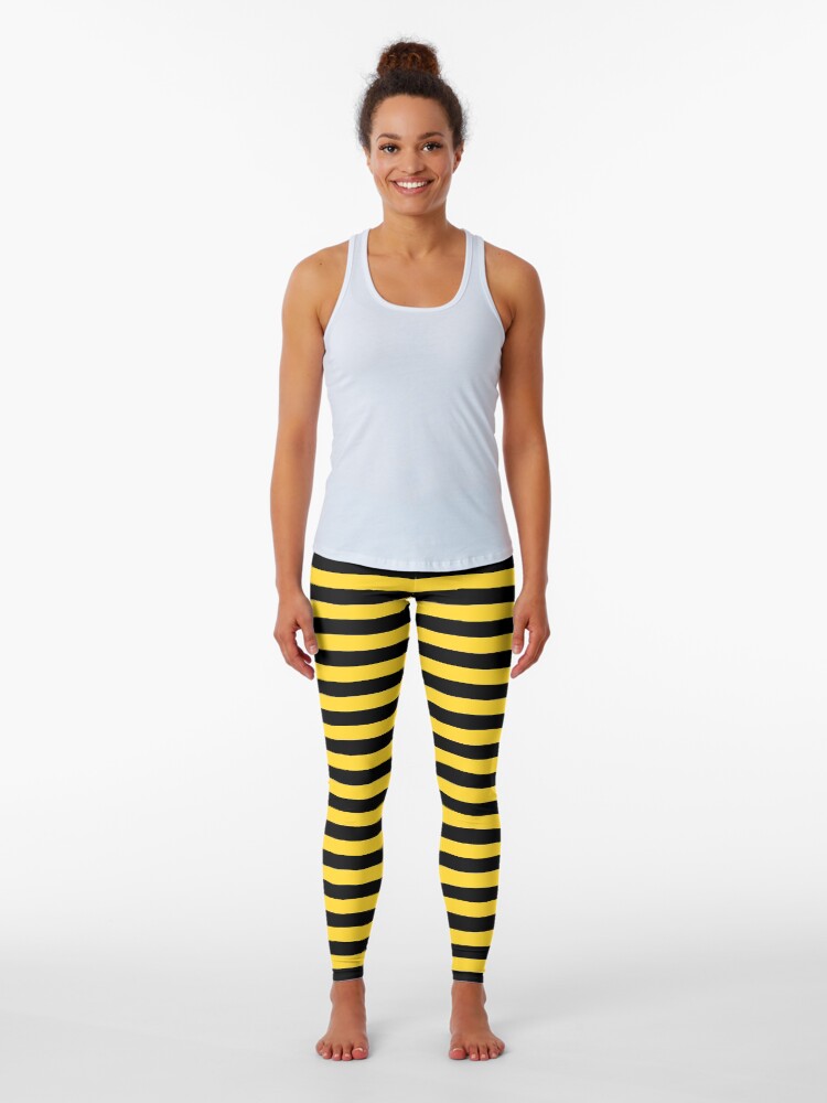 yellow leggings with black stripe