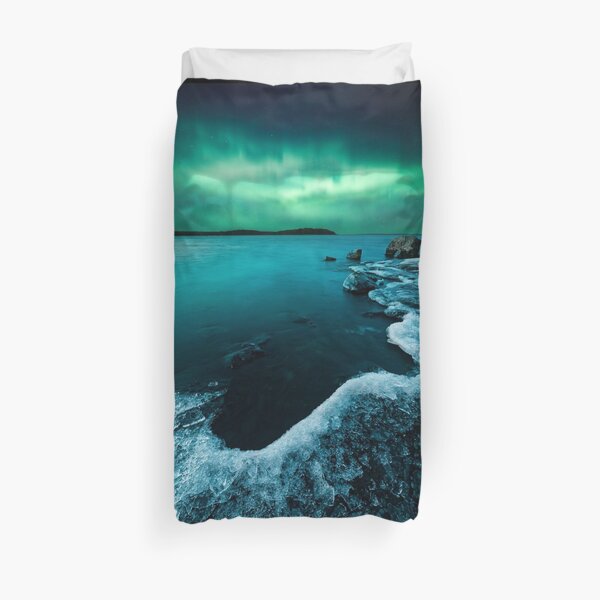 Ice on the lake shore and northern lights landscape Duvet Cover