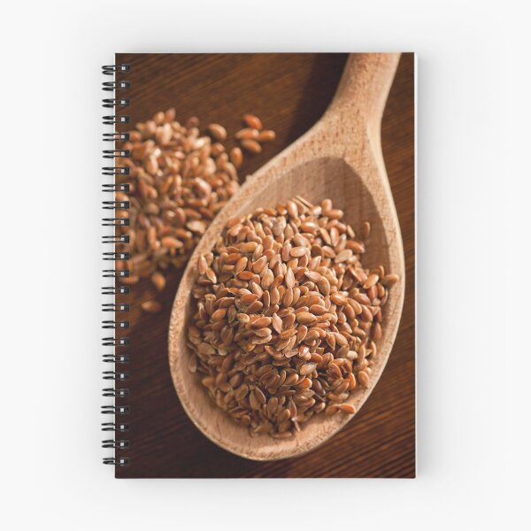 Item preview, Brown linseeds portion on wooden spoon designed and sold by Arletta Cwalina.