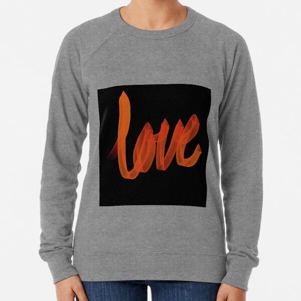 orange sweatshirt with black writing