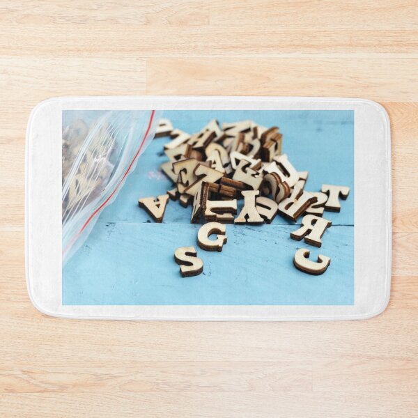 Item preview, Light brown wooden basic bold font style full alphabet capital letter on realistic wood background with plastic bag designed and sold by sigoisette.