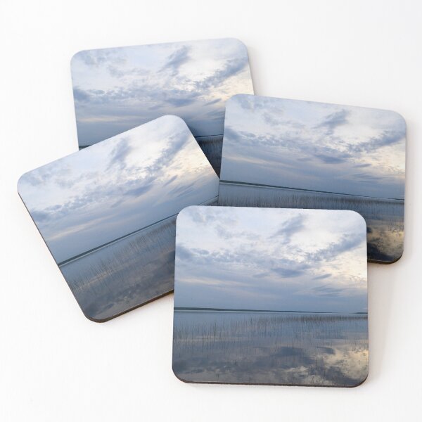 Item preview, Sunlight in the cloudy blue sky is reflected in the clear spring water of the lake at sunset designed and sold by yarvin13.