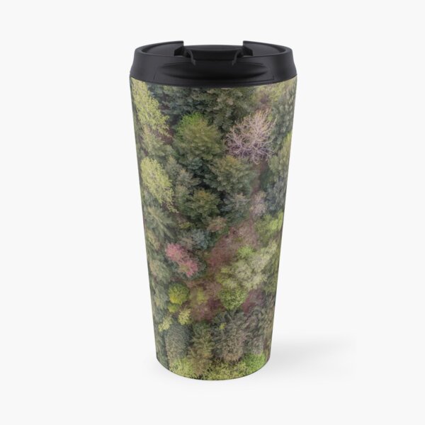 Down shot into a forrest Travel Mug