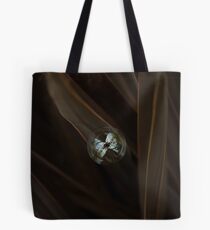 Bubble on an orchid leaf Tote Bag