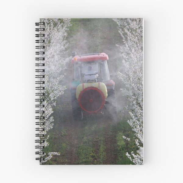 Item preview, tractor sprays insecticide in cherry orchard in spring   designed and sold by goceris.
