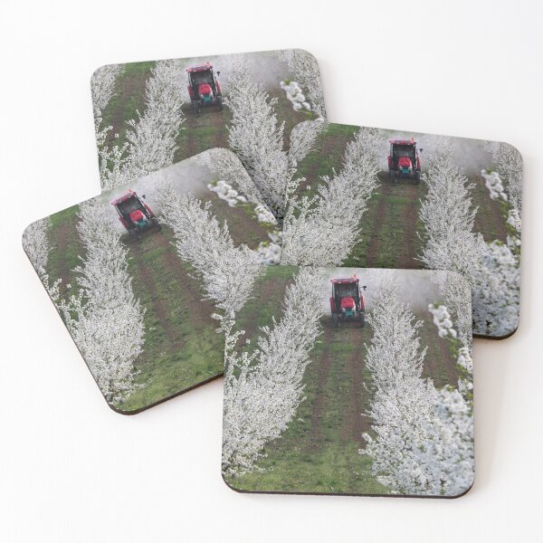 Item preview, tractor sprays insecticide in cherry orchard on the hill designed and sold by goceris.