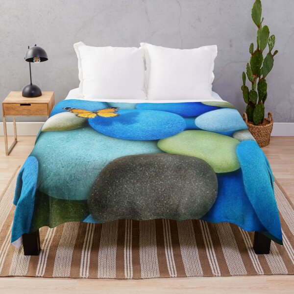 Item preview, Monarch Butterfly flutters over colorful blue stones in a pond designed and sold by MindChirp.