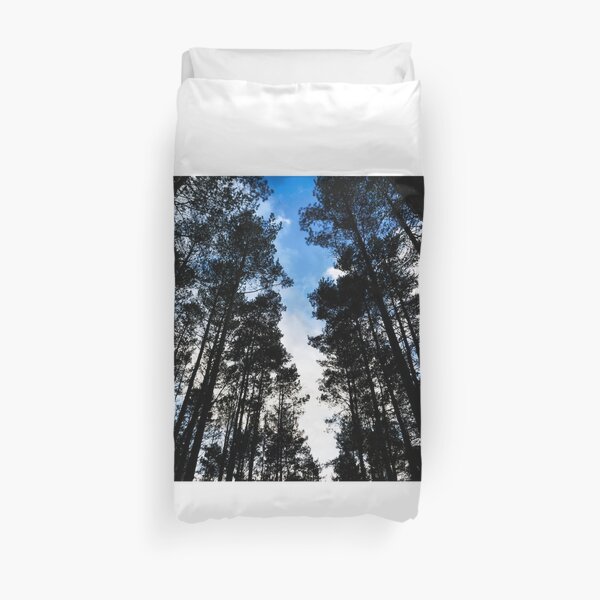 Blue skies and trees at Swinley Forest Duvet Cover