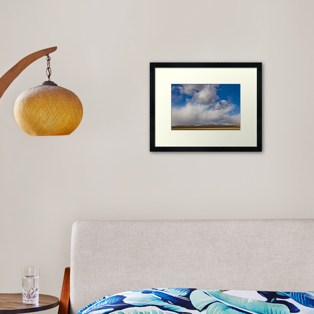 Storm Skies Over The Plains Framed Art Print