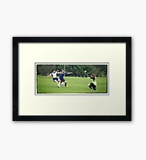 The Grabber Framed Print