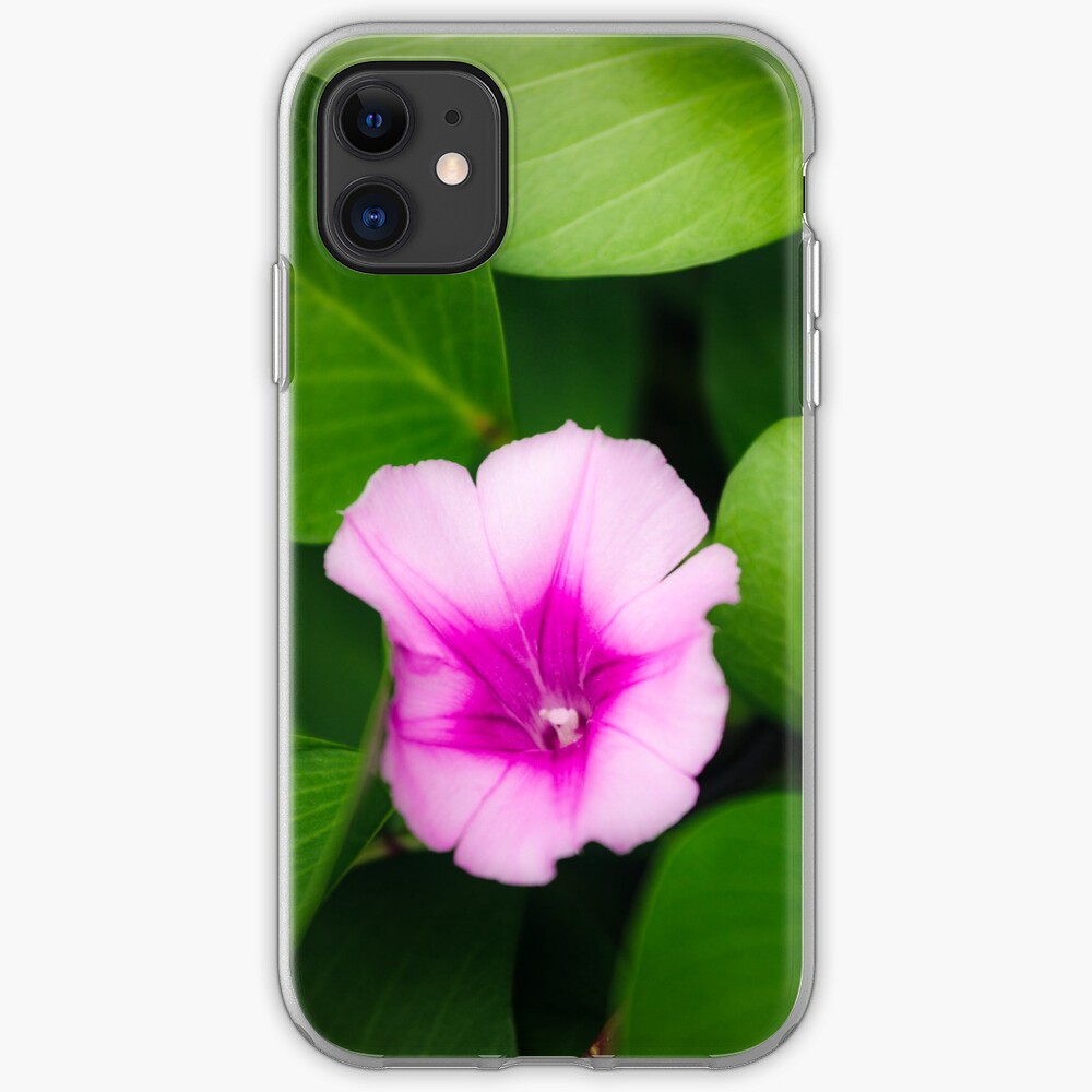 Purple flower between green leaves iPhone Case & Cover