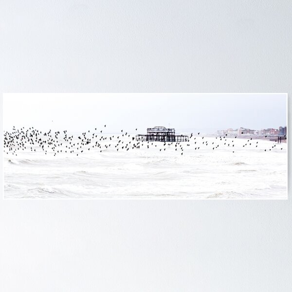 Item preview, Stormy starling murmuration over Brighton's West Pier designed and sold by GinnyScholes.