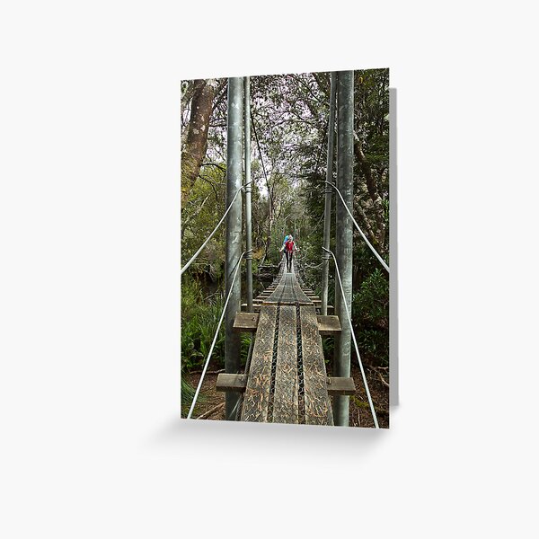 Returing across the rope bridge from Frenchmans Cap, Tasmania Greeting Card