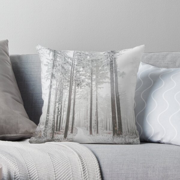 Mysterious road in a frozen foggy forest Throw Pillow