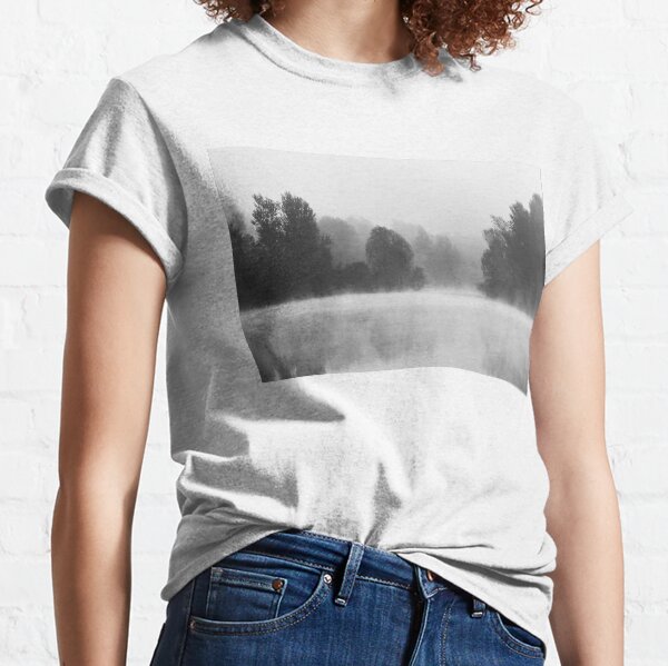 Trees disappearing in morning fog above the lake Classic T-Shirt