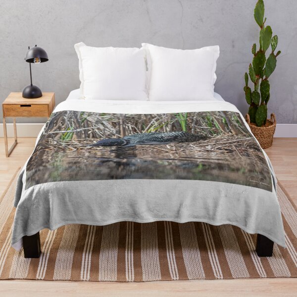 Item preview, Loon sitting on her nest. designed and sold by Simpsonwildlife.
