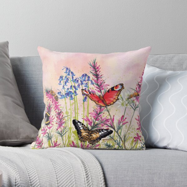 Wild meadow bathed in pink light Throw Pillow