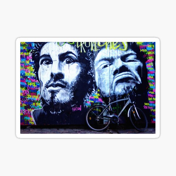 Graffiti sur un mur la tête dans le guidon Sticker
