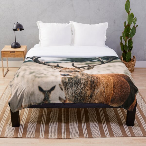 The proud deer Throw Blanket
