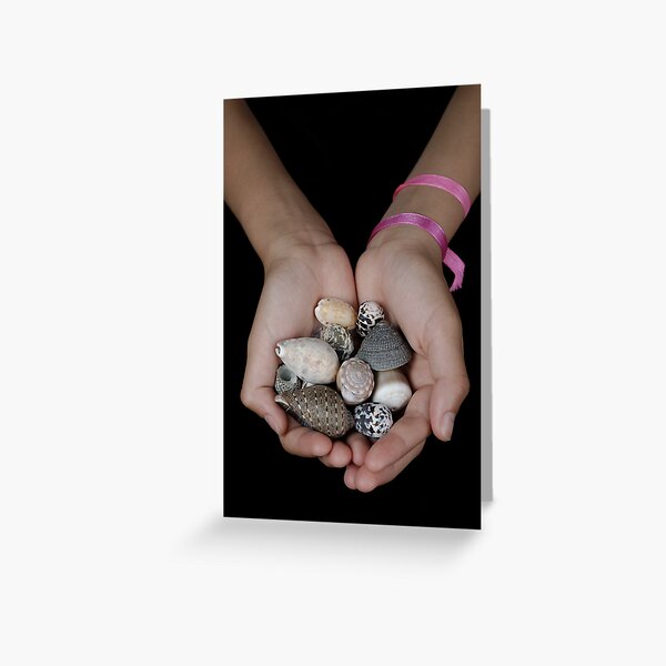 Girl (13-14 years) holding shells in clasped hands Greeting Card