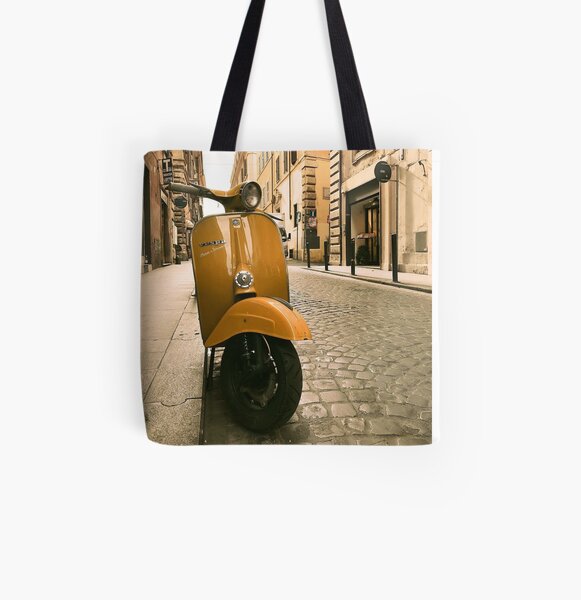 Yellow vespa motorcycle on the street in Italy All Over Print Tote Bag