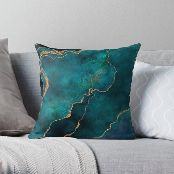 Turquoise and gold store cushions