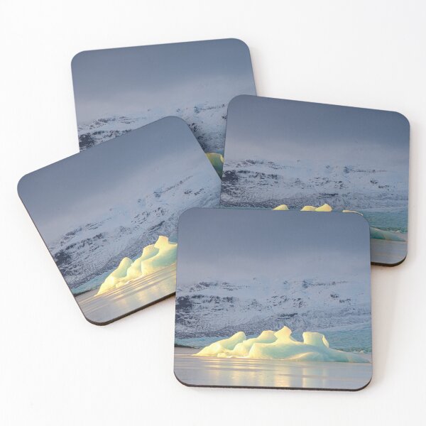Item preview, Iceland: an iceberg highlighted by golden rays of sunset designed and sold by VadimK.
