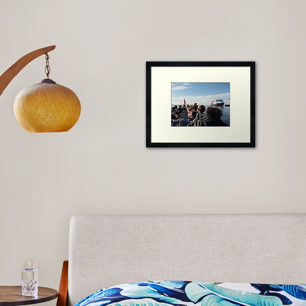 Paddling past the ferry Framed Art Print