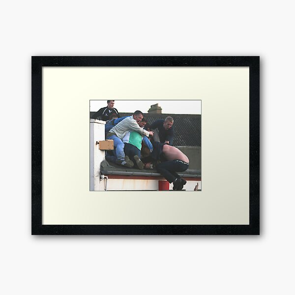 Rooftop action Framed Art Print