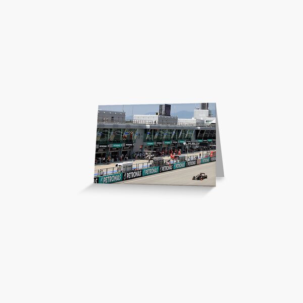 Lotus Renault F1 across the Pit Garages Greeting Card