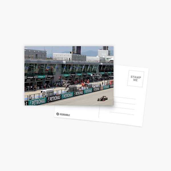 Lotus Renault F1 across the Pit Garages Postcard