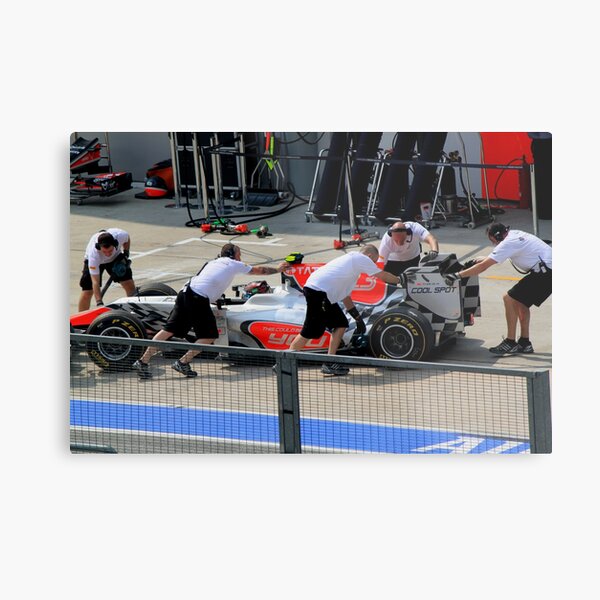 Vitantonio Luizzi calls it a day in his HRT F1 Metal Print