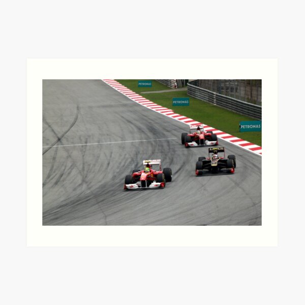 Ferarri's Massa overtakes Lotus Renault's Petrov Art Print