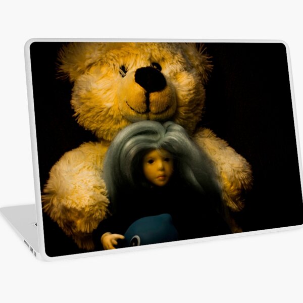 Teddy bear, doll and a rubber duck Laptop Skin