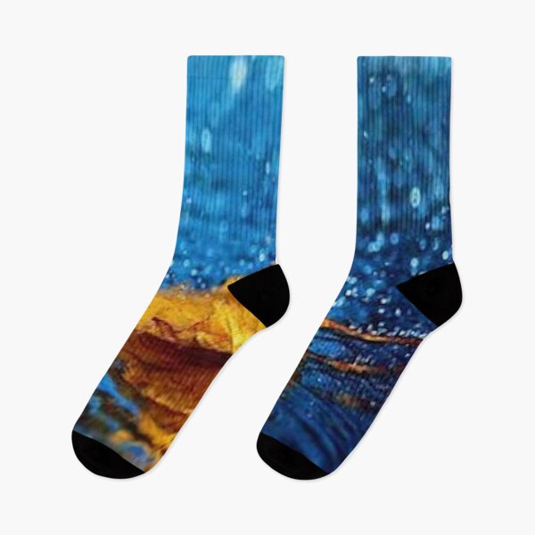 Item preview, Rain falling on an autumn leaf with reflection - blue & gold color bokeh pattern designed and sold by MindChirp.