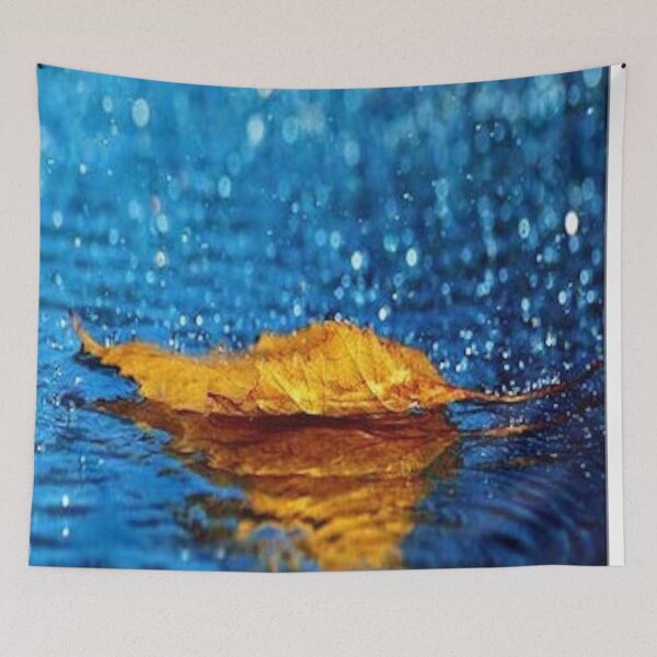 Item preview, Rain falling on an autumn leaf with reflection - blue & gold color bokeh pattern designed and sold by MindChirp.