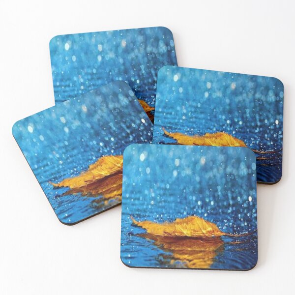 Item preview, Rain falling on an autumn leaf with reflection - blue & gold color bokeh pattern designed and sold by MindChirp.
